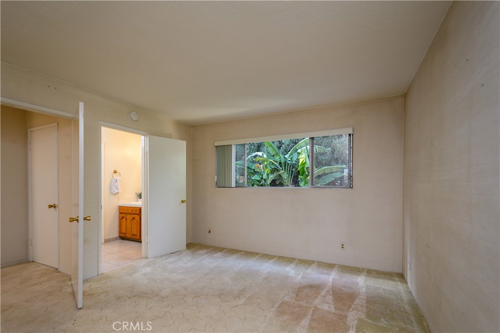 Upstairs bedroom, second primary room in the house - 1301 Ironwood Street, La Habra CA 90631 - photo 16