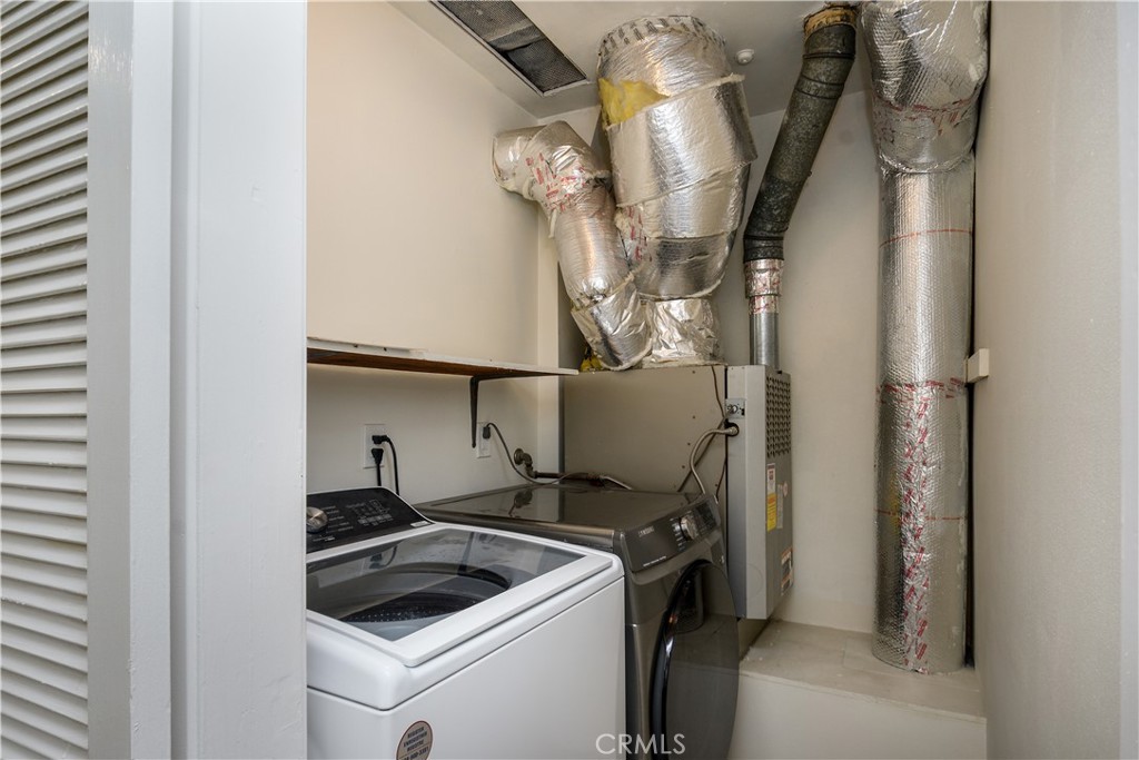 Laundry room downstairs - 1301 Ironwood Street, La Habra CA 90631 - photo 21
