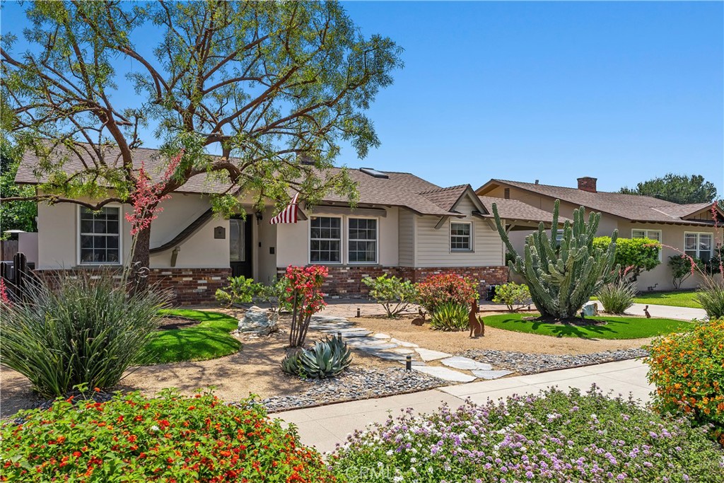 Welcome to 140 E Greenwood! From the moment you arrive, there is a sense that this home has been cared for with intentio - 140 E Greenwood, La Habra CA 90631 - photo 1