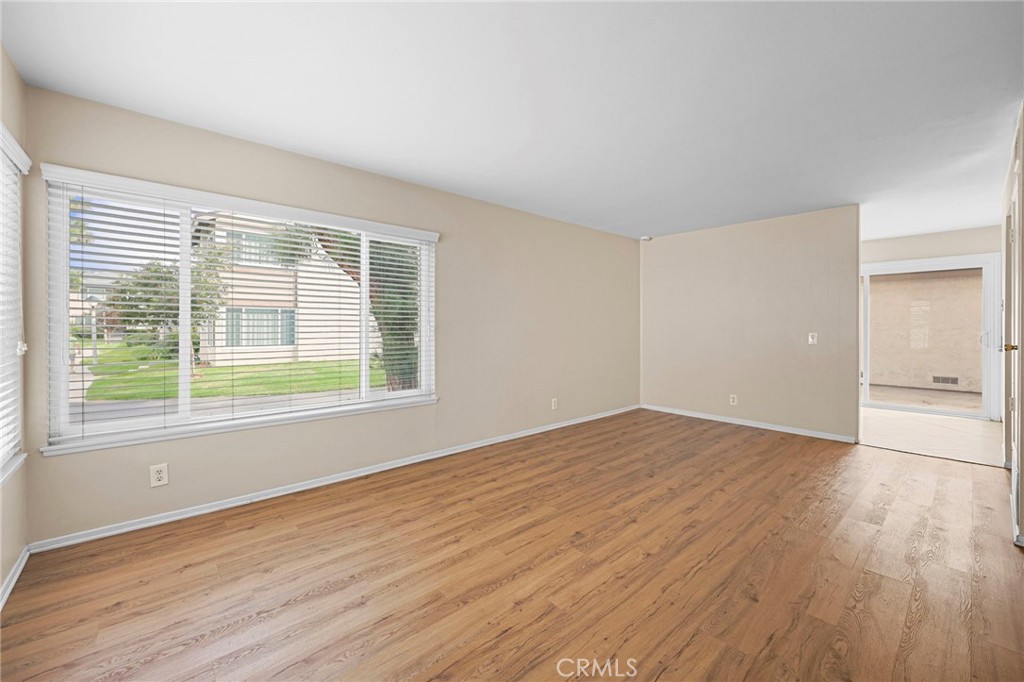 Living Room with much natural light from large windows - 1401 Cheltenham Lane, La Habra CA 90631 - photo 5