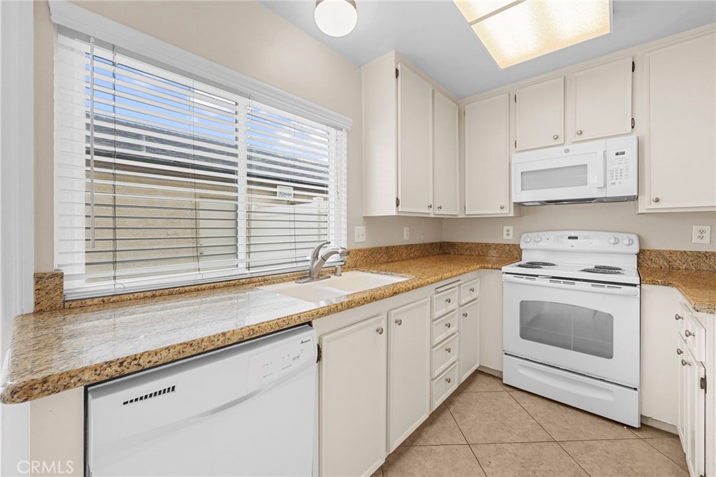 Kitchen with Granite Countertops - 1401 Cheltenham Lane, La Habra CA 90631 - photo 10