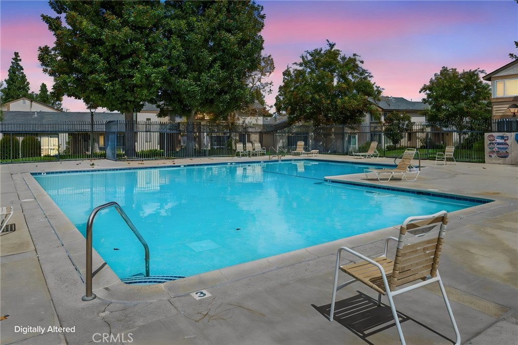Sparkling HOA Pool virtual twilight - 1401 Cheltenham Lane, La Habra CA 90631 - photo 30