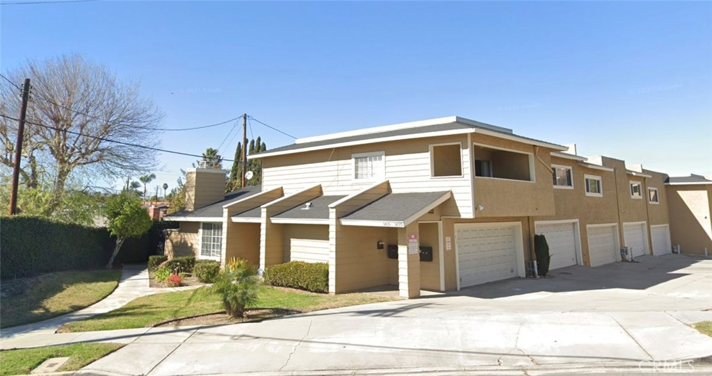 Community Front with two car garages and private entry to left side. - 1427 Hillandale Avenue 8, La Habra CA 90631 - photo 1