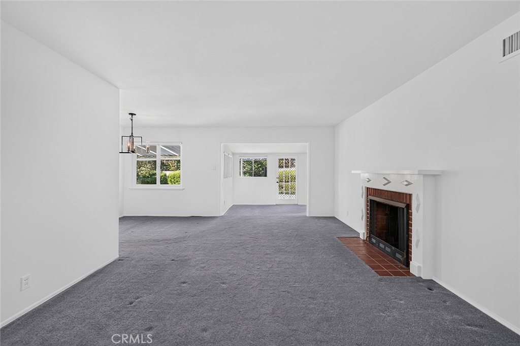 Living room with fireplace - 2471 Oakland Drive, La Habra CA 90631 - photo 2
