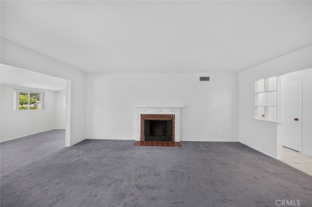 Living room with fireplace - 2471 Oakland Drive, La Habra CA 90631 - photo 4