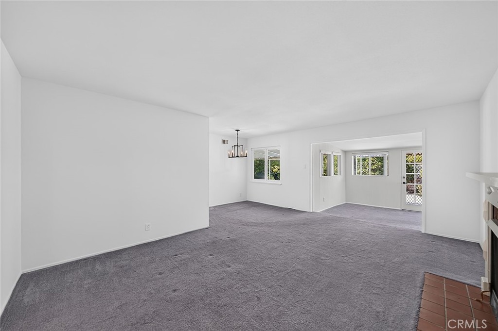 Living room, Dining room and step down to the Family room - 2471 Oakland Drive, La Habra CA 90631 - photo 6