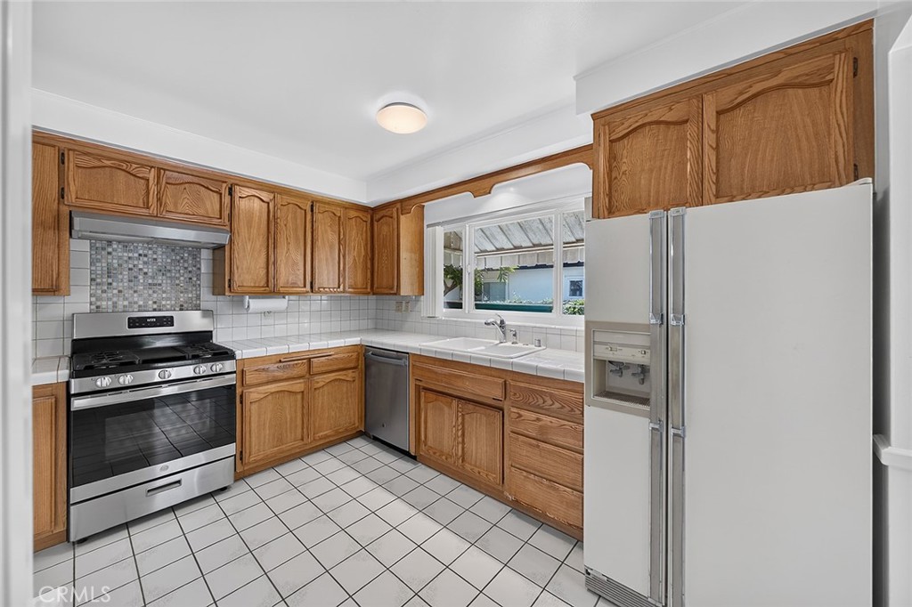 Kitchen with newer Range - 2471 Oakland Drive, La Habra CA 90631 - photo 19