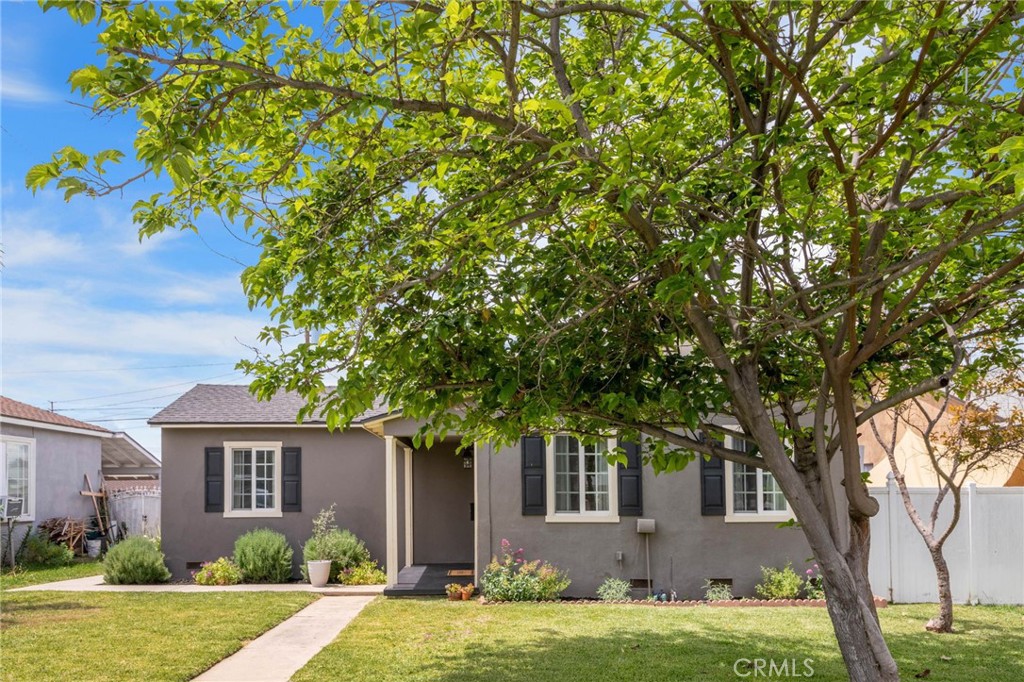 Shutters in front add character. Tree provides added shade. - 315 S Bedford, La Habra CA 90631 - photo 1