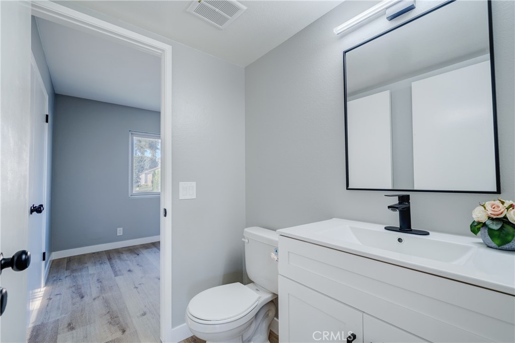 Downstairs half bath - 750 Hartford Lane, La Habra CA 90631 - photo 17