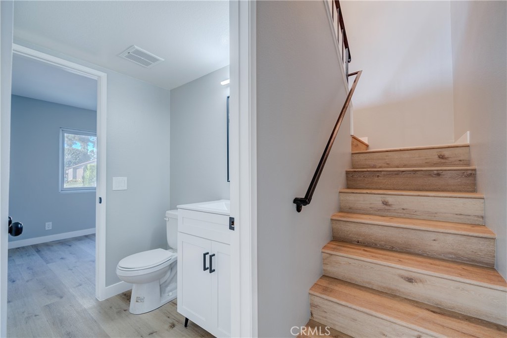 Downstairs half bath and staircase - 750 Hartford Lane, La Habra CA 90631 - photo 18