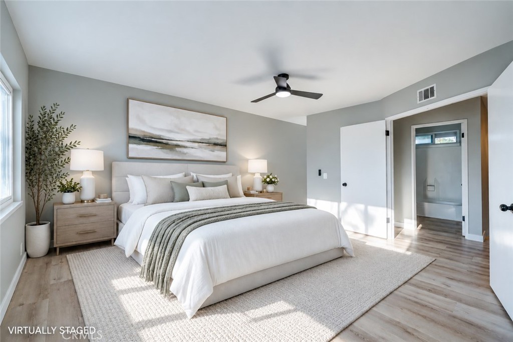 Virtually staged primary bedroom - 750 Hartford Lane, La Habra CA 90631 - photo 19