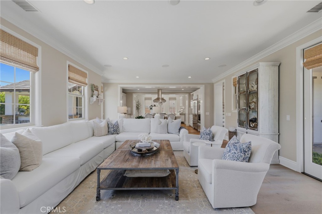 Great room open to the kitchen and courtyard and backyard ~ - 10 Jenny, Ladera Ranch CA 92694 - photo 20