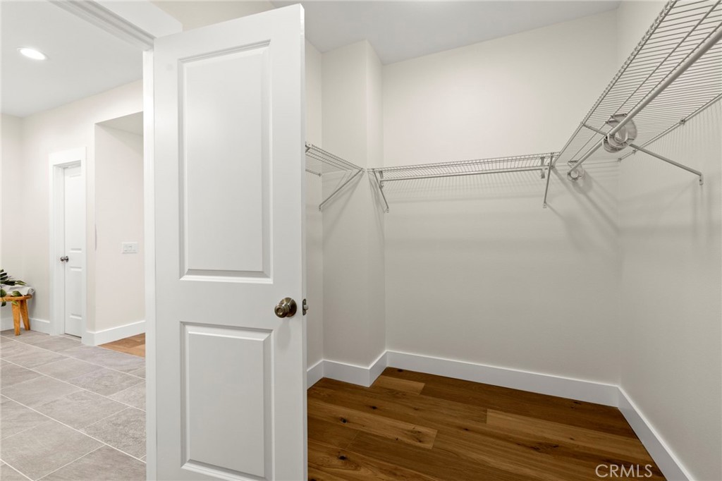 Primary walk-in closet - 11 Patina Lane, Ladera Ranch CA 92694 - photo 28