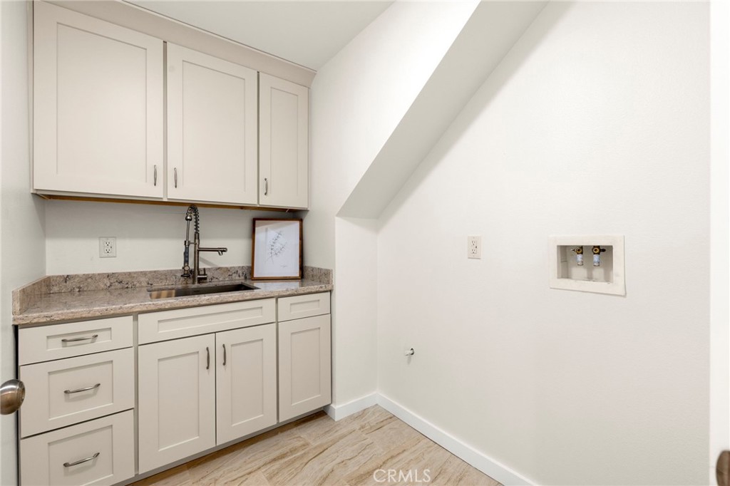 Landry room with sink - 11 Patina Lane, Ladera Ranch CA 92694 - photo 48