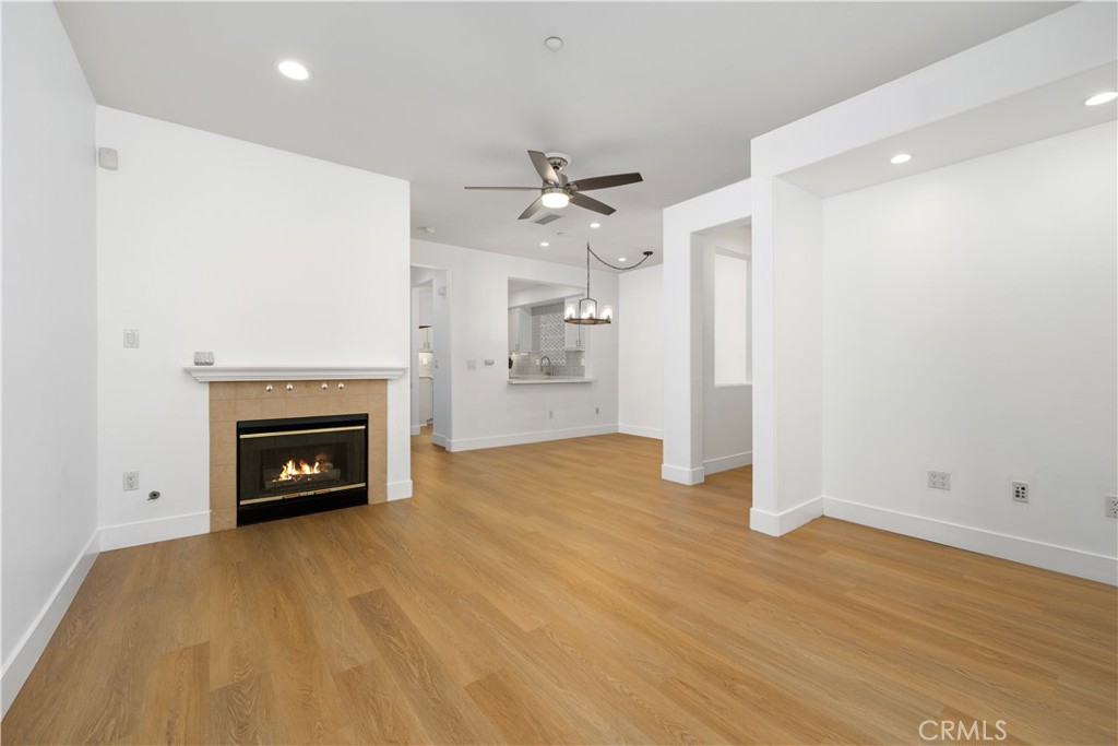 Family room ~ fireplace - 123 Sklar 37, Ladera Ranch CA 92694 - photo 6