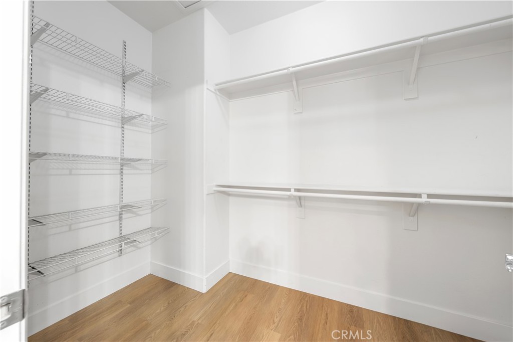 Primary Suite ~ spacious walk-in closet - 123 Sklar 37, Ladera Ranch CA 92694 - photo 22