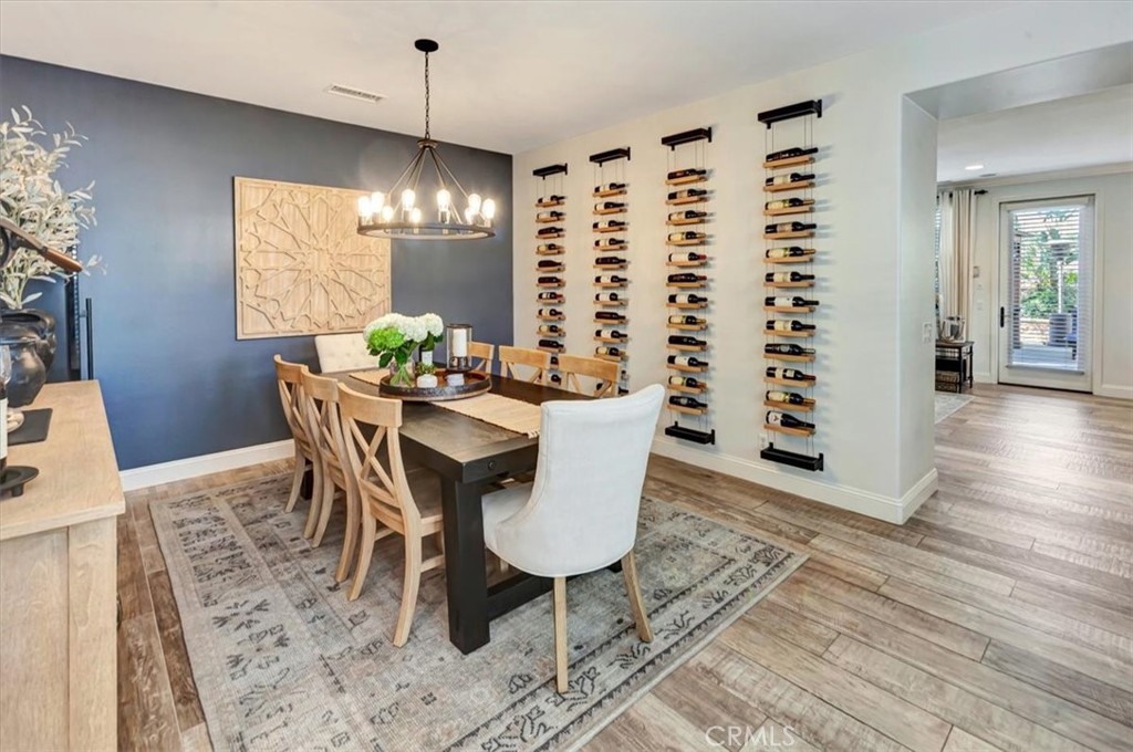 Dining room with wall wine cable wine storage. - 15 Julia Street, Ladera Ranch CA 92694 - photo 14