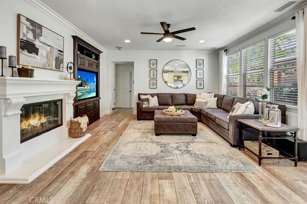 Beautiful fireplace & built-in entertainment space in family room. - 15 Julia Street, Ladera Ranch CA 92694 - photo 16