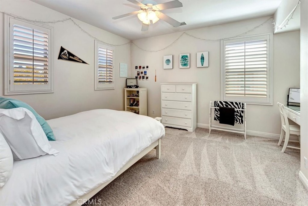 Bedroom 4 with built-in desk. - 15 Julia Street, Ladera Ranch CA 92694 - photo 32