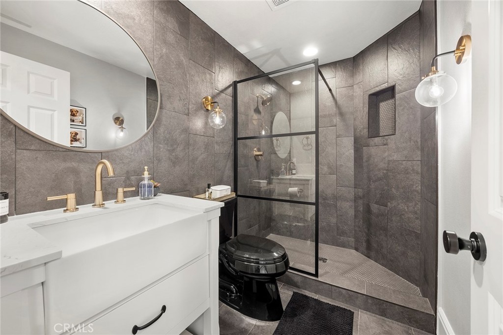 Downstairs bathroom. - 16 Kempton Lane, Ladera Ranch CA 92694 - photo 31