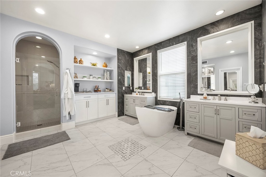 Primary bathroom with separate shower and separate tub. - 16 Kempton Lane, Ladera Ranch CA 92694 - photo 36