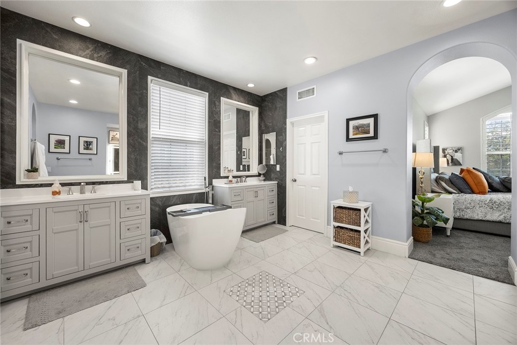 Primary bathroom with tile flooring. - 16 Kempton Lane, Ladera Ranch CA 92694 - photo 41