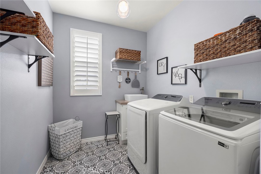 Upstairs laundry room. - 16 Kempton Lane, Ladera Ranch CA 92694 - photo 45