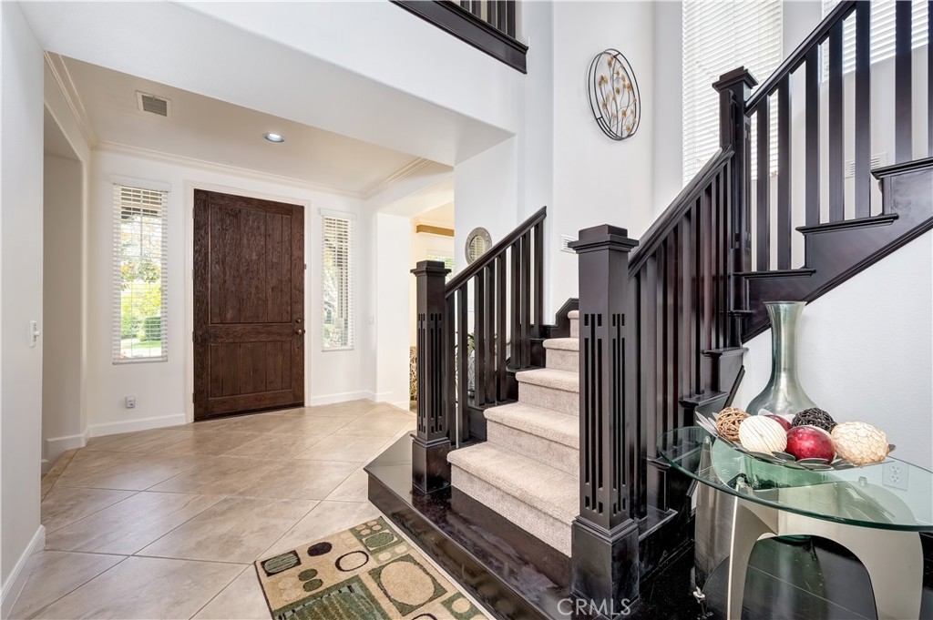 Stunning Craftsman Stairwell grounding the home with its structural weight and rich, organic warmth. - 17 Winslow, Ladera Ranch CA 92694 - photo 4