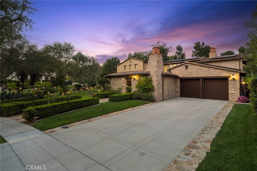 Exterior front with plush landscape and beautiful lighting - 2 Ali Lane, Ladera Ranch CA 92694 - photo 1