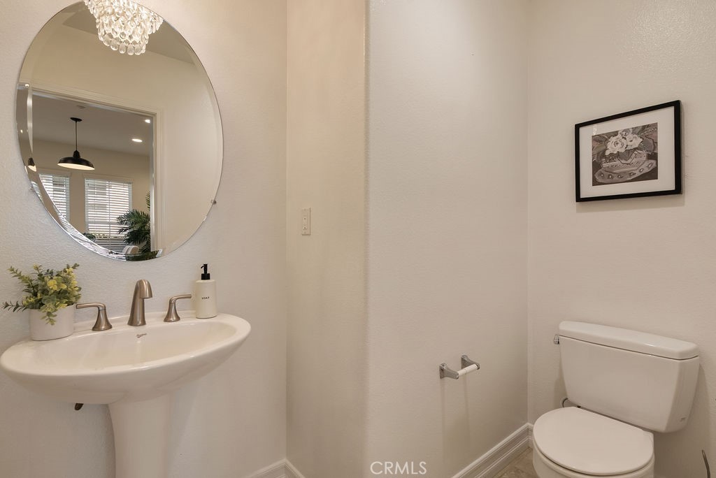 Downstairs 1/2 bath - 20 Orange Blossom Circle, Ladera Ranch CA 92694 - photo 15