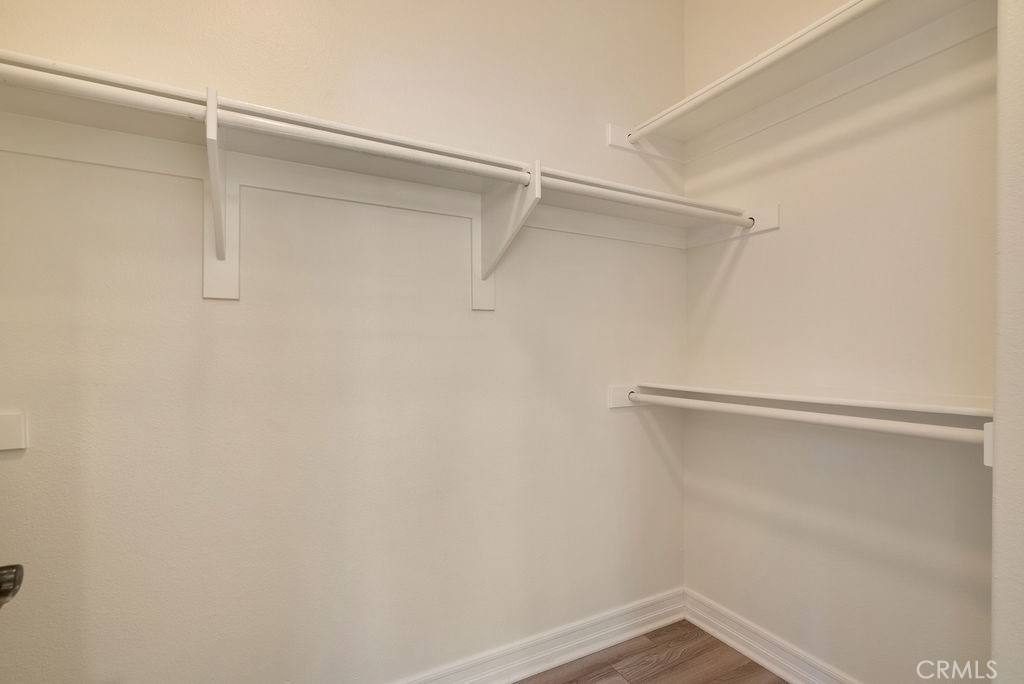 Primary walk in closet - 20 Orange Blossom Circle, Ladera Ranch CA 92694 - photo 23