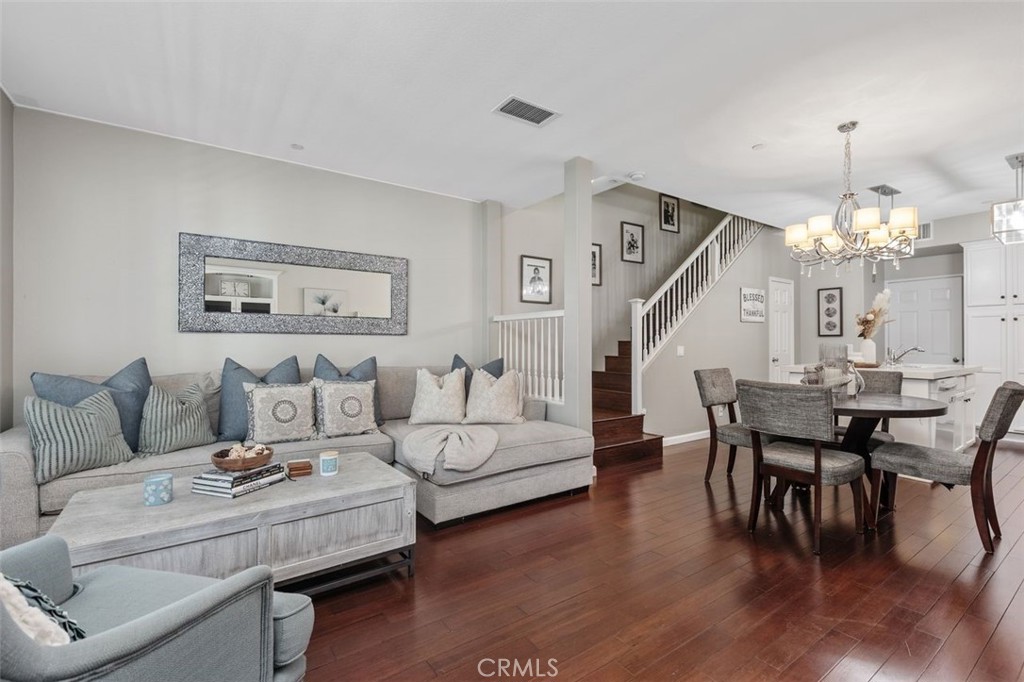 Open and spacious living space with gorgeous bamboo wood flooring and designer accents. - 25 Platinum, Ladera Ranch CA 92694 - photo 5