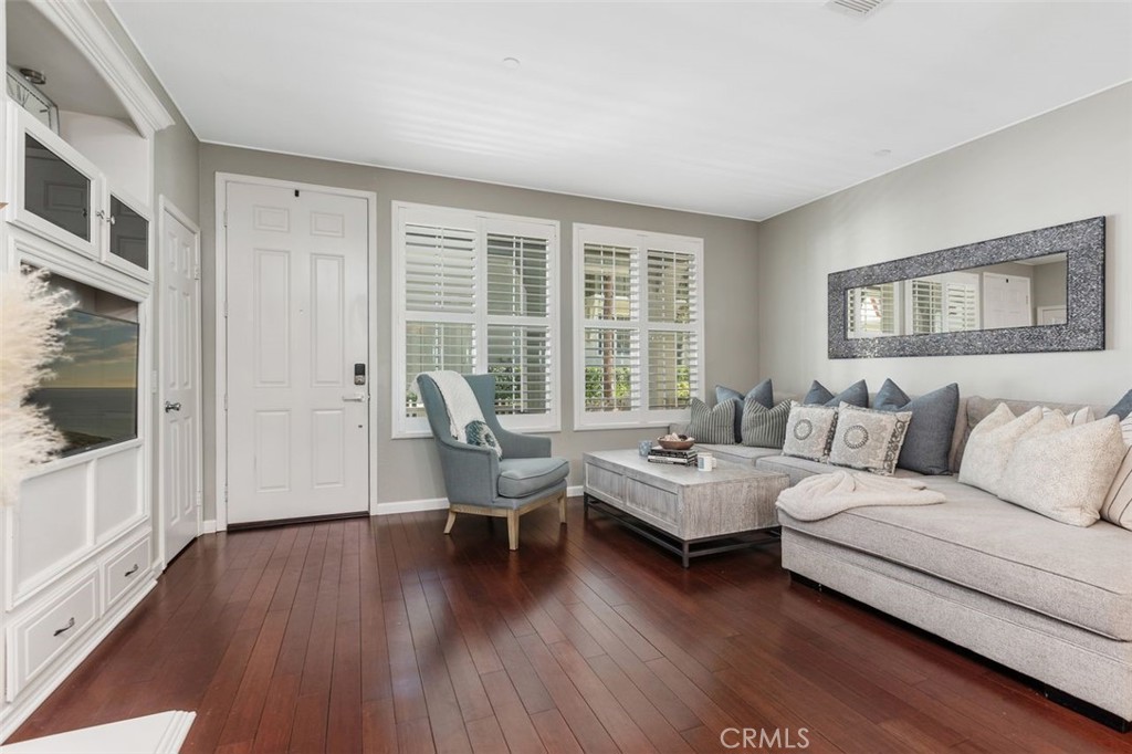 Built in entertainment center, light and bright natural lighting. - 25 Platinum, Ladera Ranch CA 92694 - photo 6