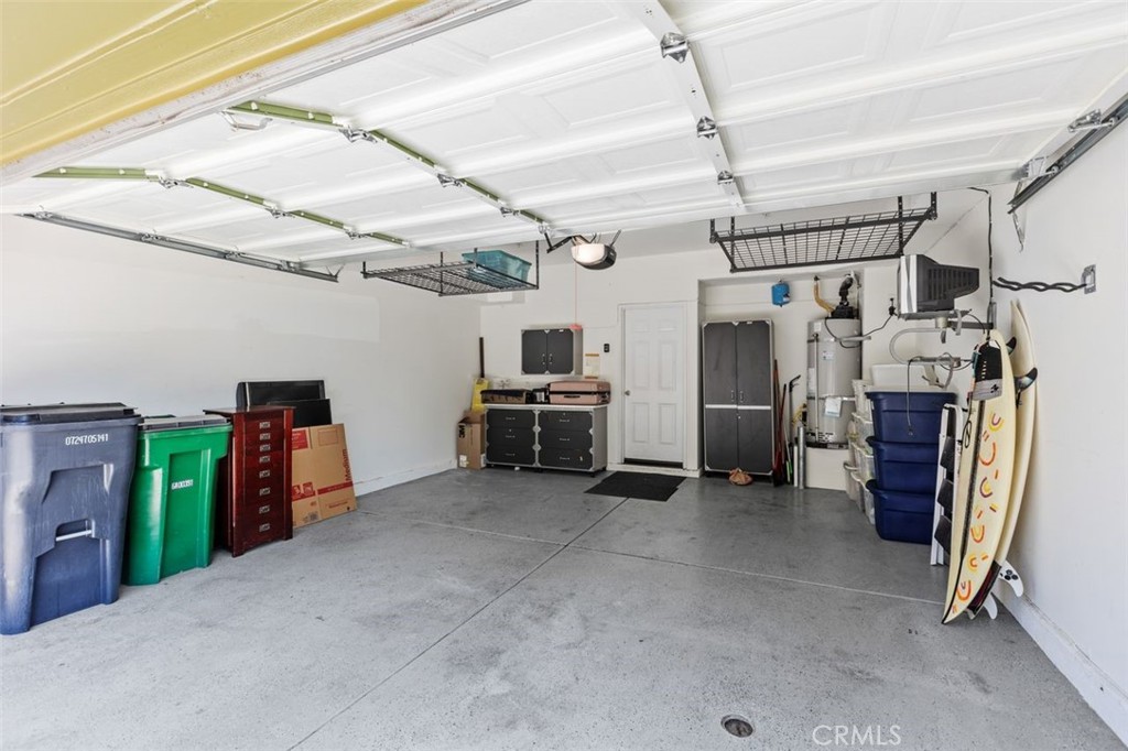 Large two car garage with over head storage. There is also a area which 2 cars can be on driveway. - 25 Platinum, Ladera Ranch CA 92694 - photo 33