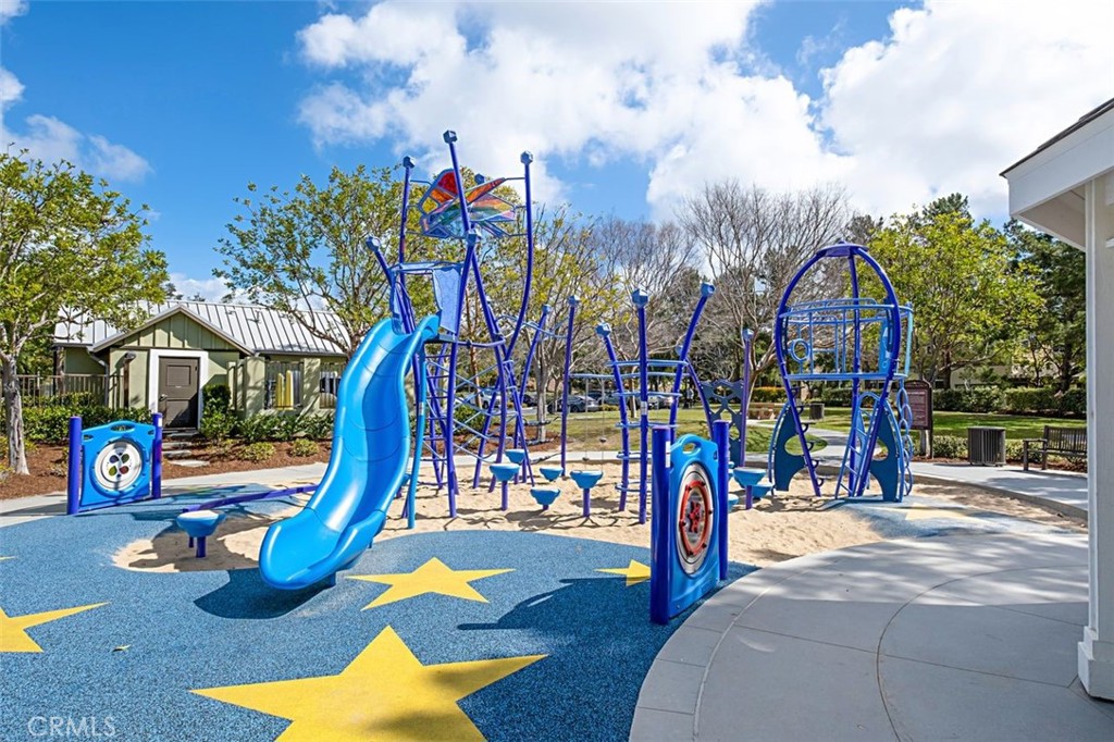 Local playground. The community offers many amenities. numerous pools, water park, sports field, tennis courts,picnic ar - 25 Platinum, Ladera Ranch CA 92694 - photo 35