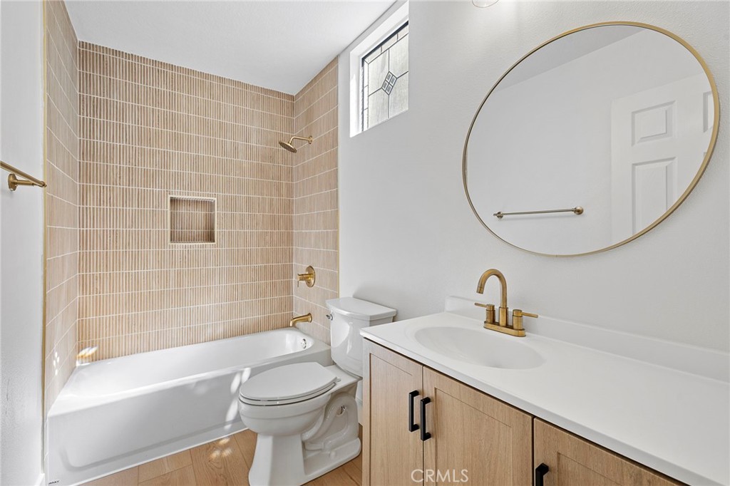 Downstairs renovated bathroom suite - 27 Rinehart, Ladera Ranch CA 92694 - photo 9