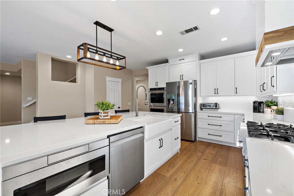 ikitchen counters /appliances - 29 Bushwood, Ladera Ranch CA 92694 - photo 6