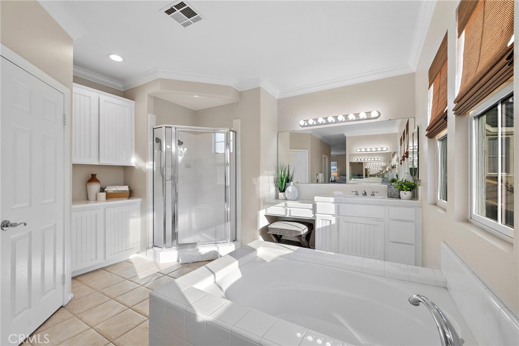 primary bath w/soaking tub, and two separate sink/vanity - 29 Bushwood, Ladera Ranch CA 92694 - photo 19