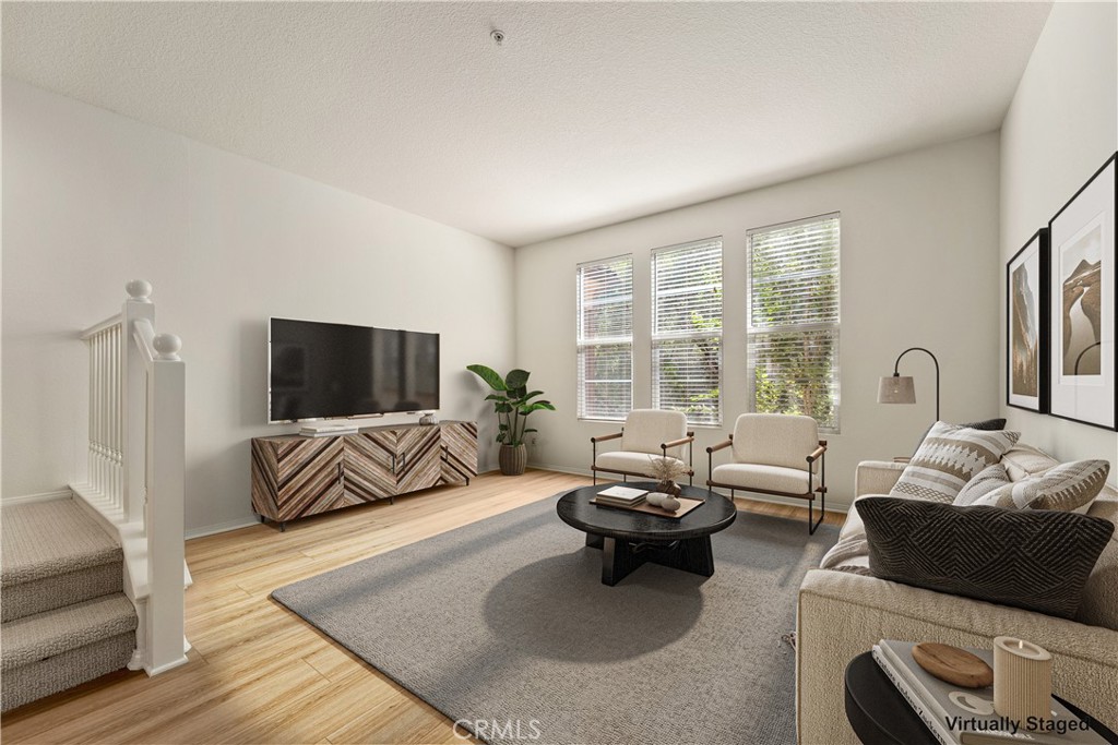 Great room - digitally enhanced with virtual staging - 30 Marcilla, Ladera Ranch CA 92694 - photo 3