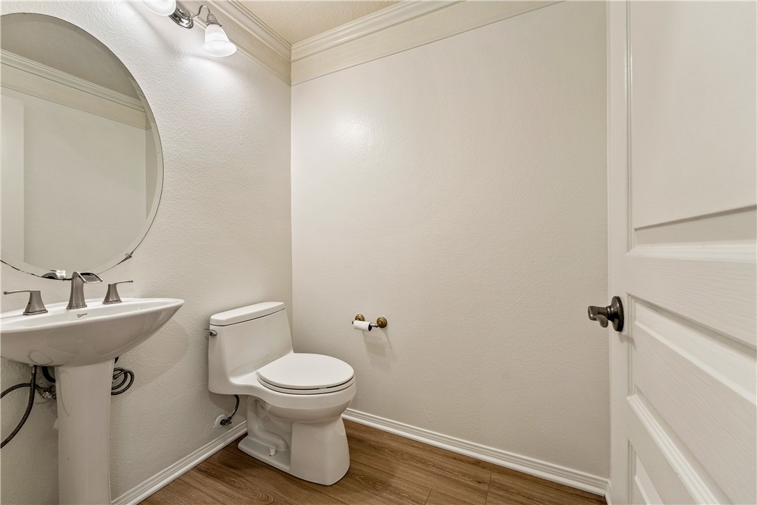 Half bathroom on same level as kitchen, great room and dining area - 30 Marcilla, Ladera Ranch CA 92694 - photo 14