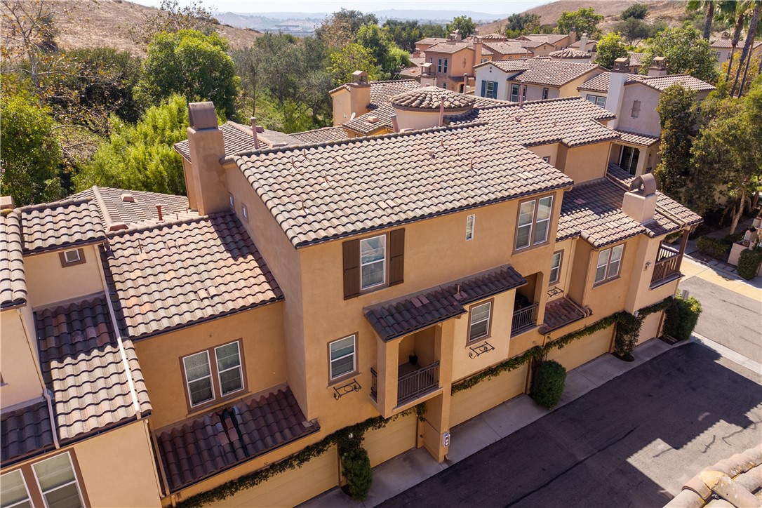 Aerial rear view of this townhouse style condominium - 30 Marcilla, Ladera Ranch CA 92694 - photo 27