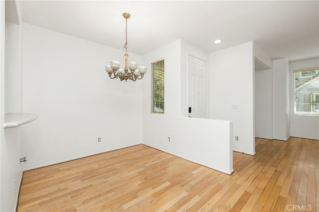 Separate dining area and eat up bar or pass through to the kitchen. - 4 Toribeth Street 8, Ladera Ranch CA 92694 - photo 3