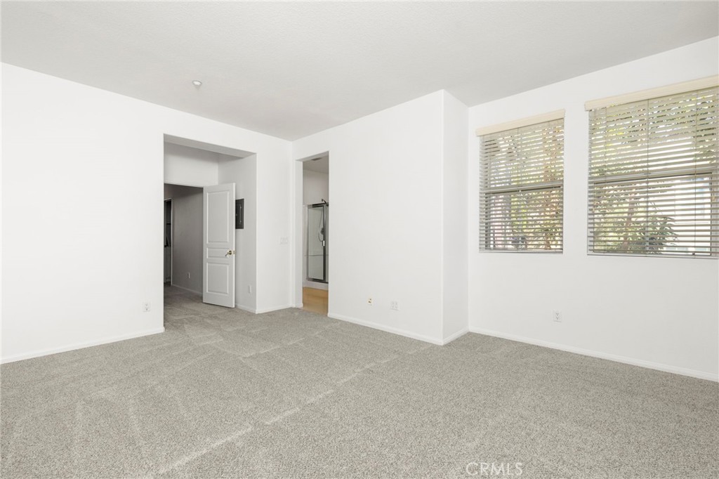 Large master bedroom with walk in closet and full attached bath. - 4 Toribeth Street 8, Ladera Ranch CA 92694 - photo 7