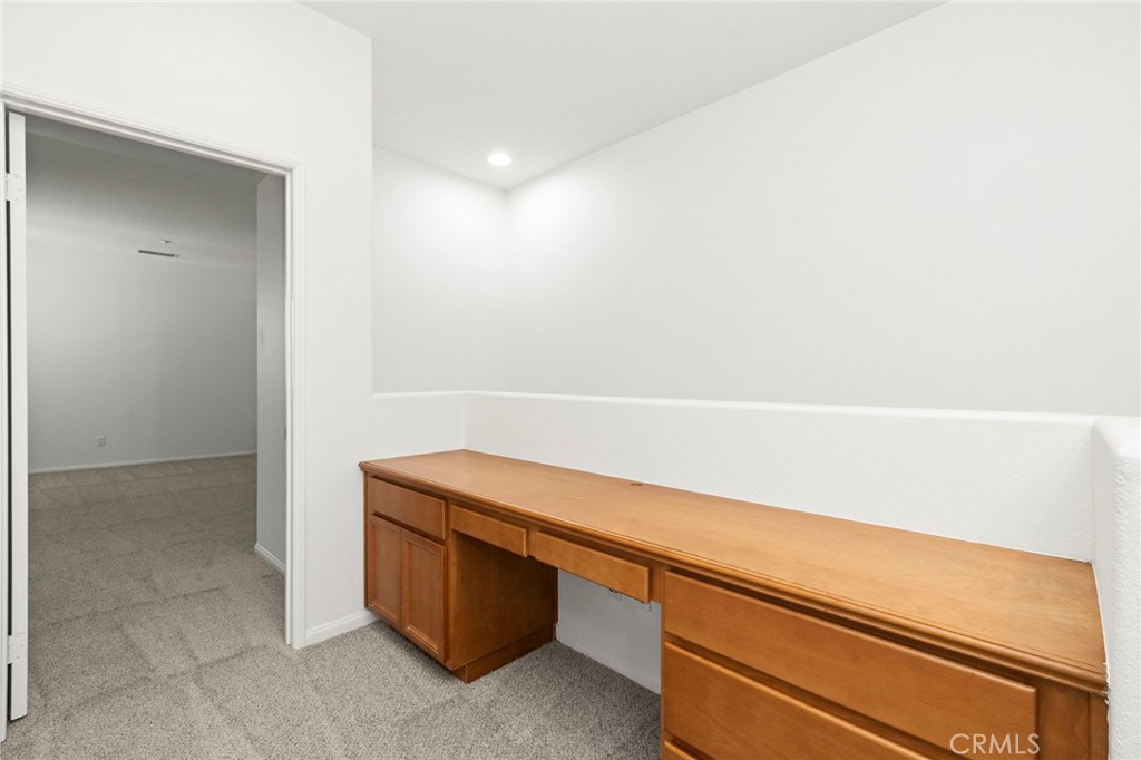 The loft has a big desk area perfect for an office or space to do homework. - 4 Toribeth Street 8, Ladera Ranch CA 92694 - photo 10