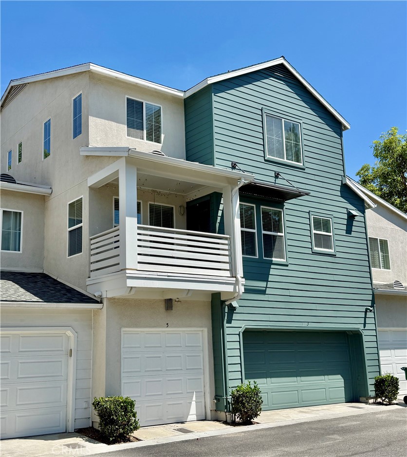 Garage #5 and view of balcony off living area - 5 Quartz, Ladera Ranch CA 92694 - photo 1