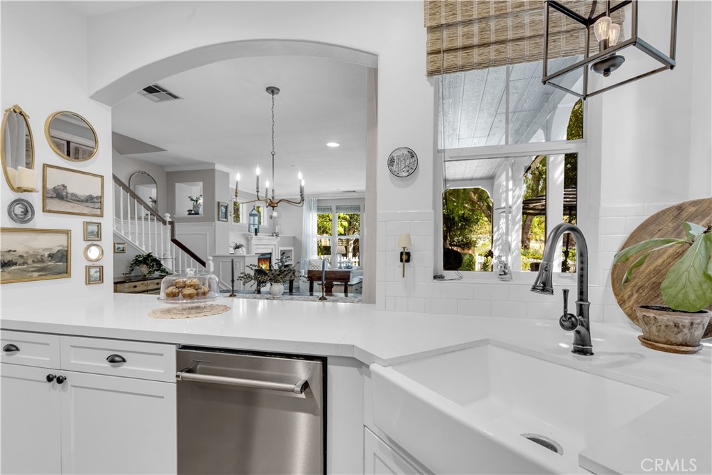 Remodeled Kitchen opens to dining and living ares - 5 Surrey Farm, Ladera Ranch CA 92694 - photo 23