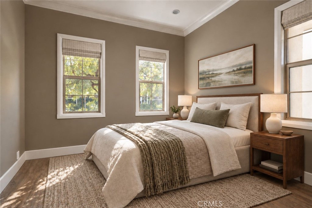 Downstairs bedroom. Digitally enhanced with virtually staged furniture - 59 Molly Loop, Ladera Ranch CA 92694 - photo 14