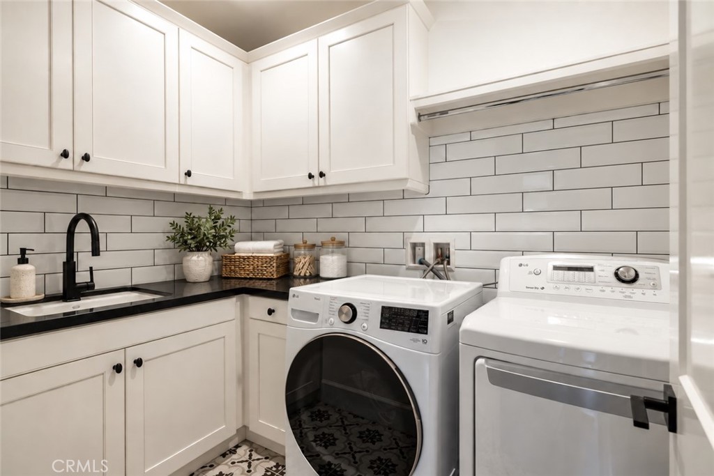 Upstairs laundry room - 59 Molly Loop, Ladera Ranch CA 92694 - photo 28