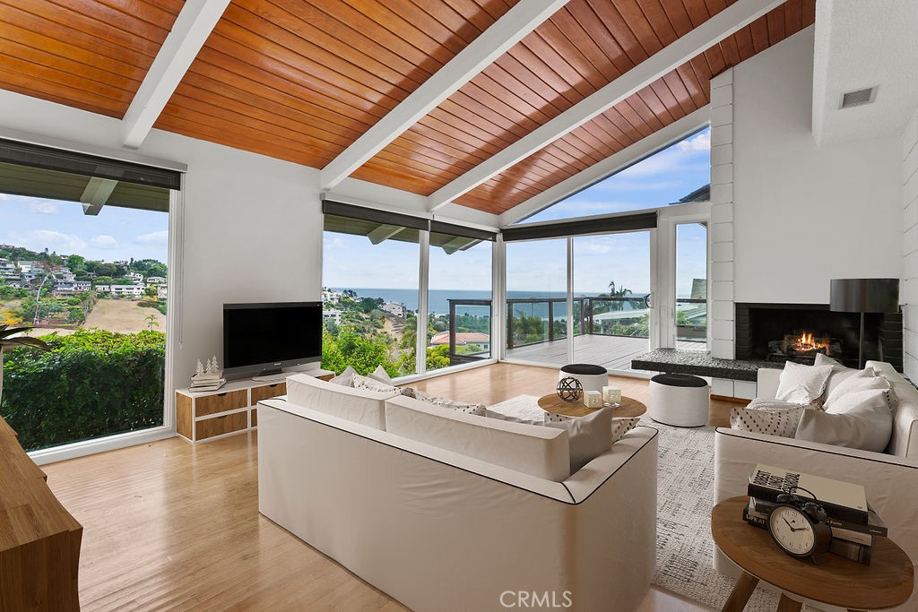 Wow! Year around view from the ocean to the hillside. Sit in front of your fireplace in winter or enjoy your deck every - 1007 Flamingo Road, Laguna Beach CA 92651 - photo 1
