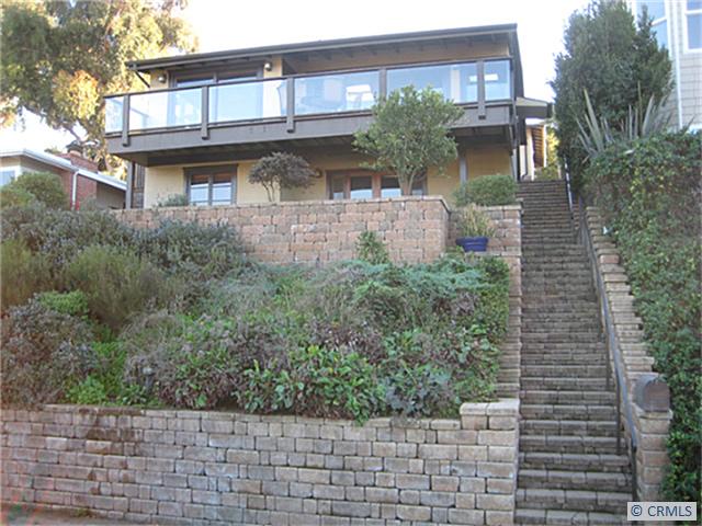 Exterior view with large upper balcony - 1015 VAN DYKE Drive, Laguna Beach CA 92651 - photo 1